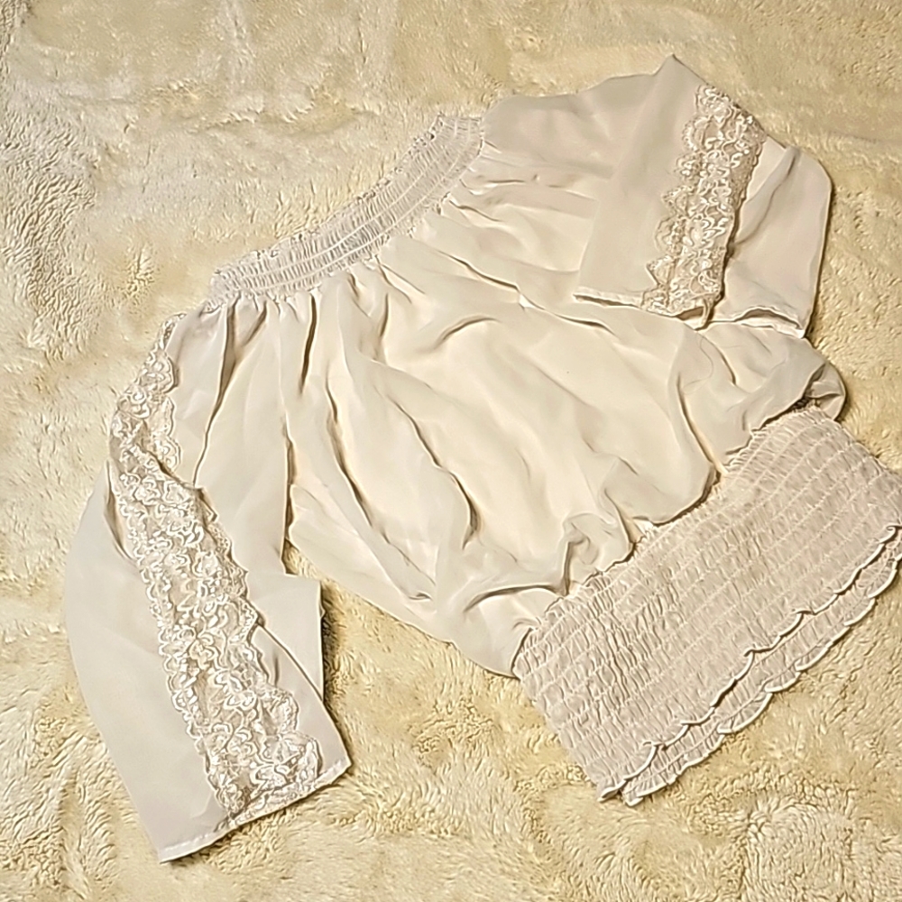 Amy wear sheer white top